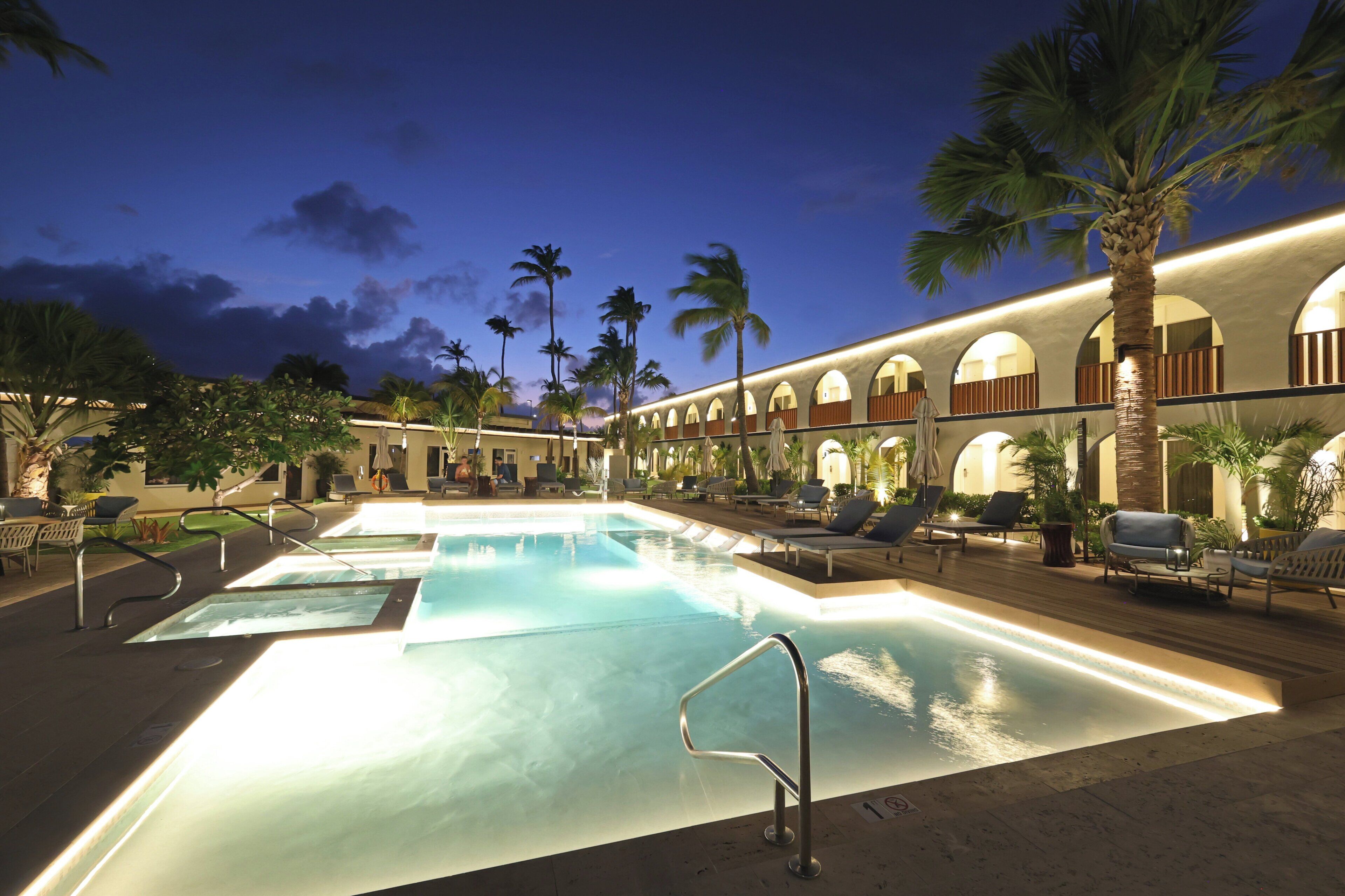 Outdoor pool, open 8:00 AM to 8:00 PM, pool umbrellas, pool loungers