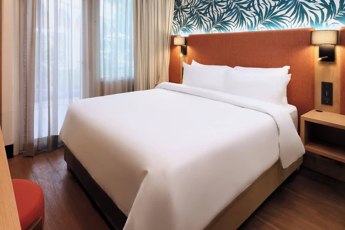 Standard Room, 1 Queen Bed, Pool View | In-room safe, desk, blackout drapes, iron/ironing board