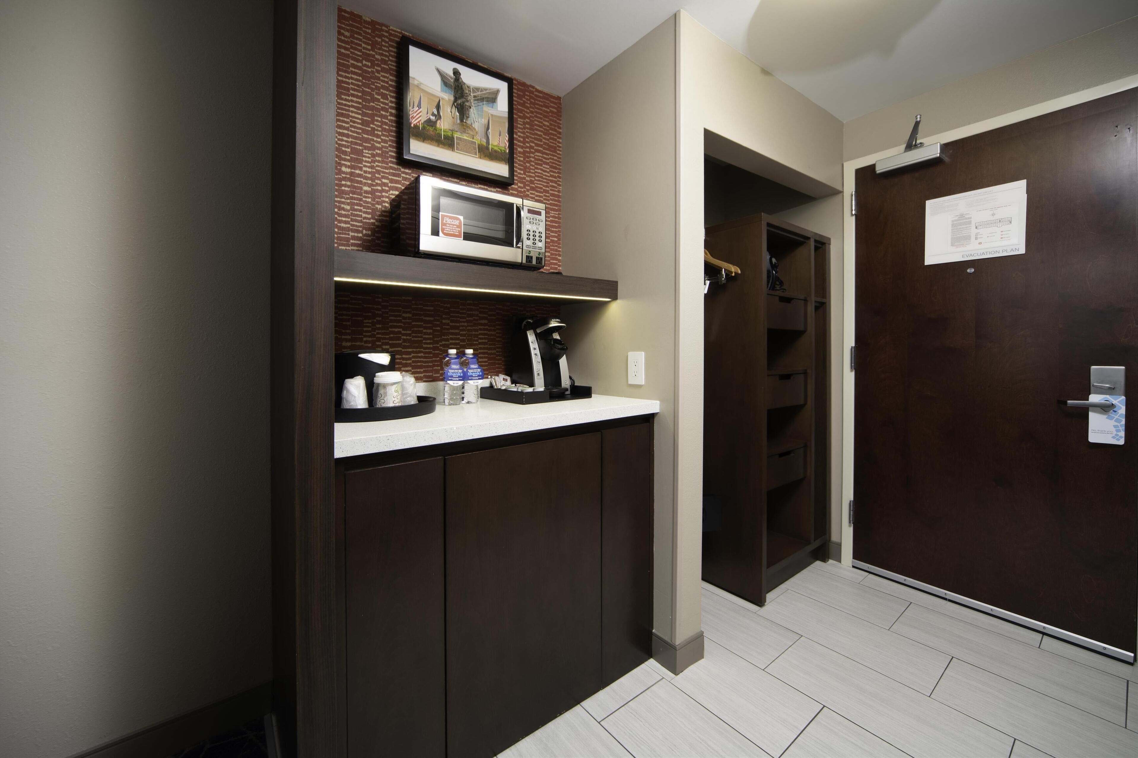 1 king bed with lounge chair | down duvets, desk, laptop workspace, soundproofing