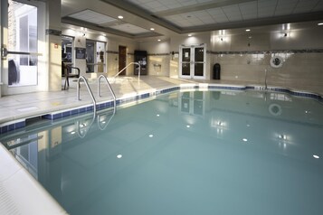 Indoor pool, open 7 AM to 10 PM, pool umbrellas, pool loungers