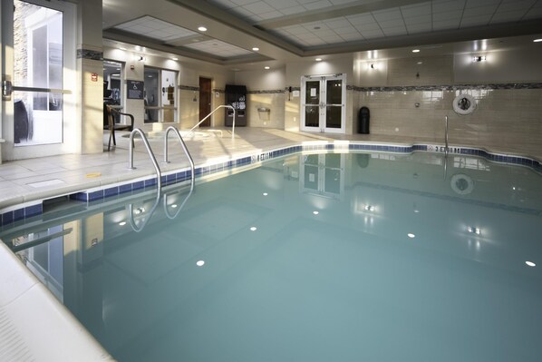 Indoor pool, open 7 AM to 10 PM, pool umbrellas, sun loungers
