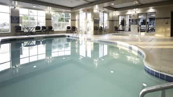 Indoor pool, open 7 AM to 10 PM, pool umbrellas, pool loungers