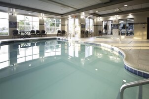 Indoor pool, open 7 AM to 10 PM, pool umbrellas, sun loungers