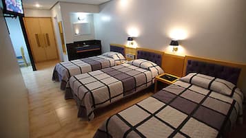 Standard Triple Room | Minibar, in-room safe, blackout drapes, free WiFi