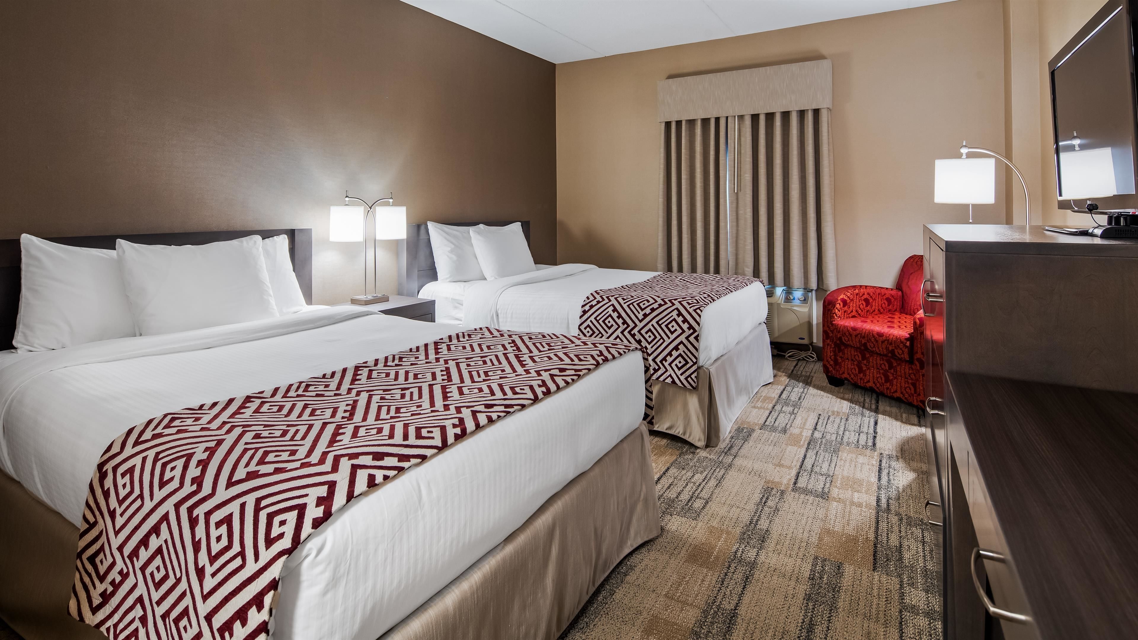 standard room, 2 double beds, non smoking | premium bedding, pillow-top beds, in-room safe, blackout curtains