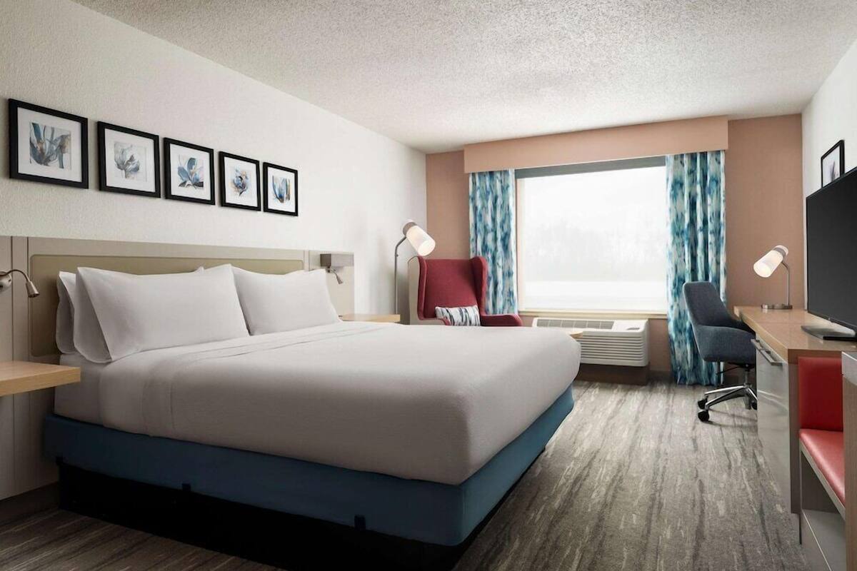 Premium bedding, desk, blackout drapes, iron/ironing board