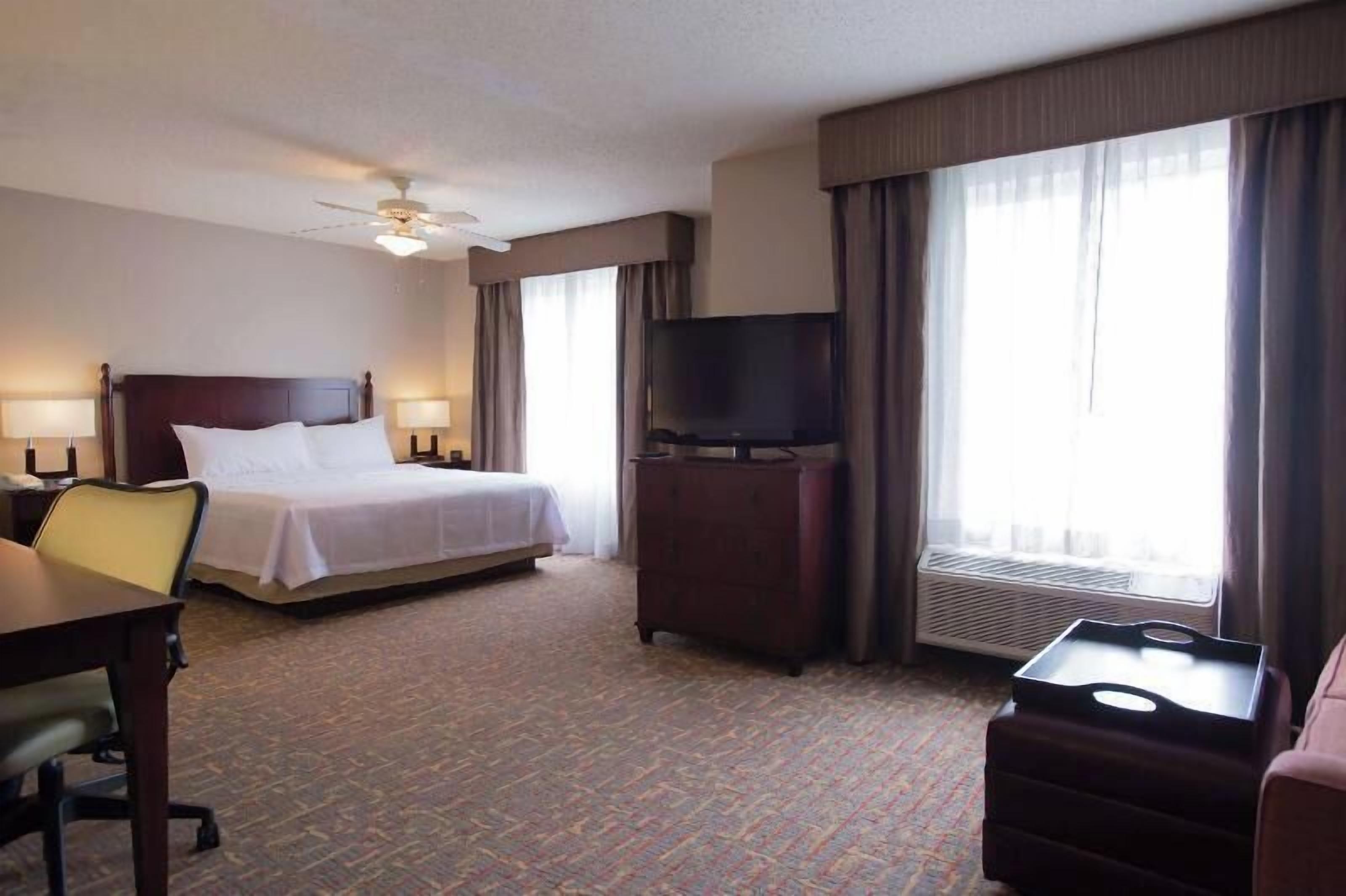 Hypo-allergenic bedding, down comforters, desk, laptop workspace