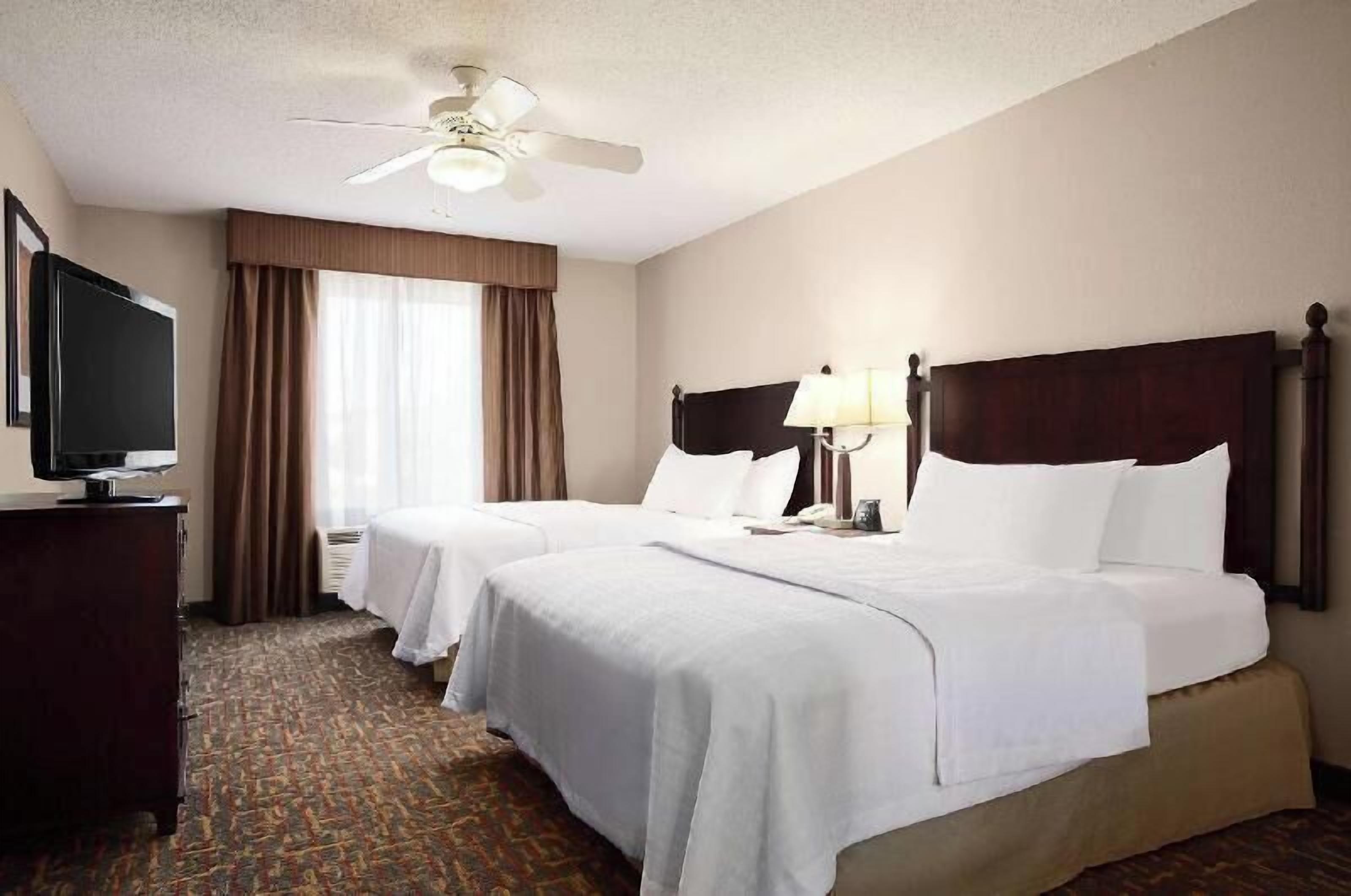 Hypo-allergenic bedding, down comforters, desk, laptop workspace