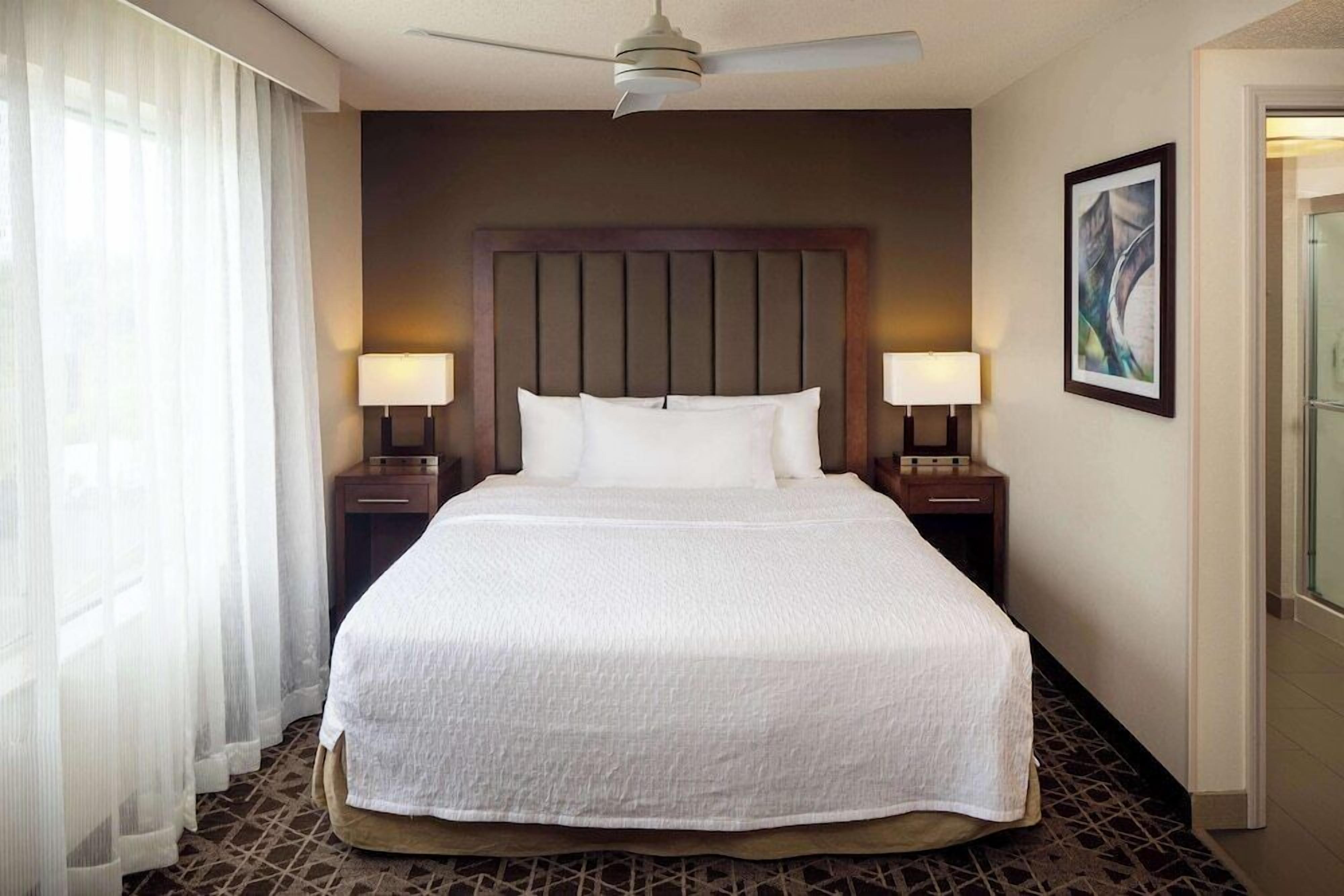 Hypo-allergenic bedding, down comforters, desk, laptop workspace