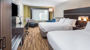 A hotel room with two beds, a desk, a chair, a TV, and a window with a view. - Holiday Inn Express Hotel & Suites Bismarck by IHG (Bismarck)