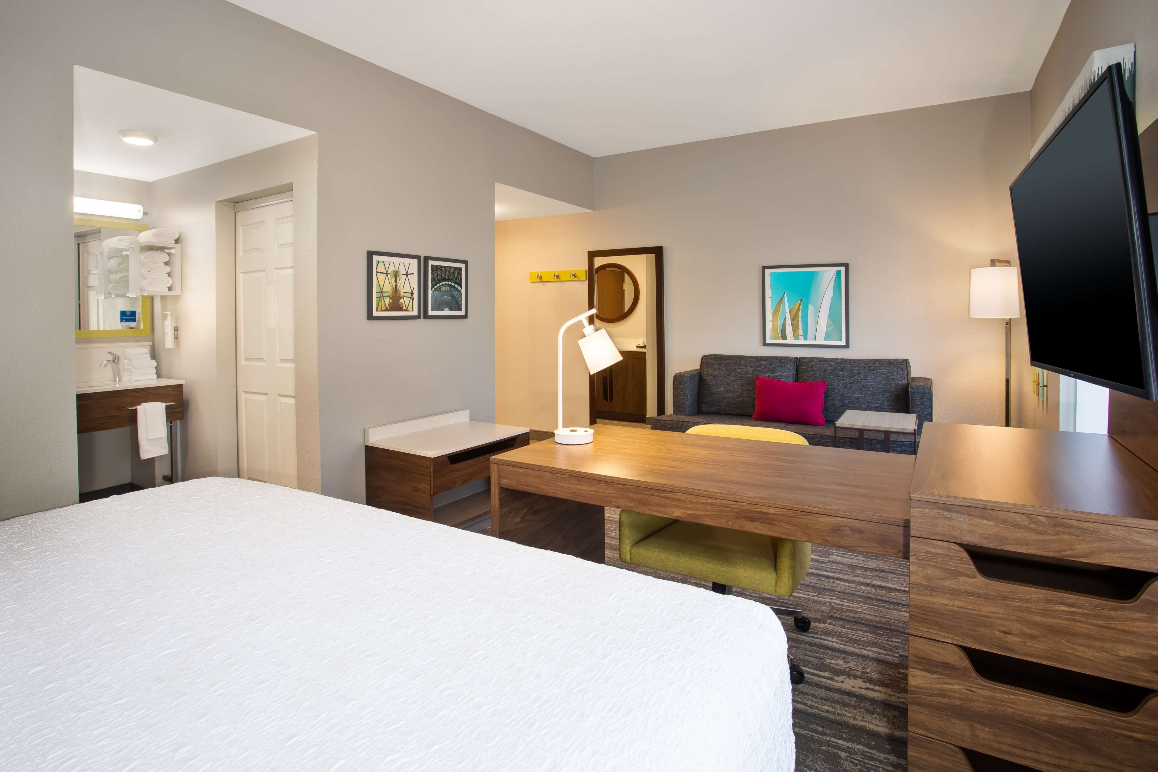 studio suite, 1 king bed with sofa bed | living area | flat-screen tv