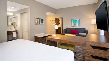 Studio Suite, 1 King Bed with Sofa bed | Living area | Flat-screen TV