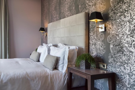 Ropa de cama de alta calidad y minibar