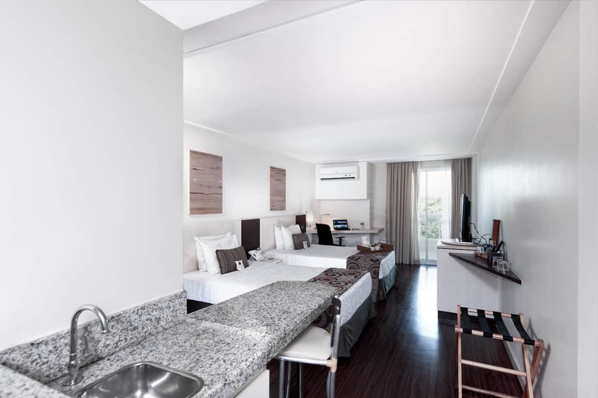 Deluxe Twin kamer, 2 eenpersoonsbedden | 1 slaapkamer, een minibar, een kluis op de kamer, een bureau
