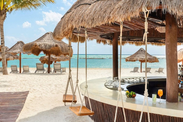 3 bars/lounges, swim-up bar, poolside bar