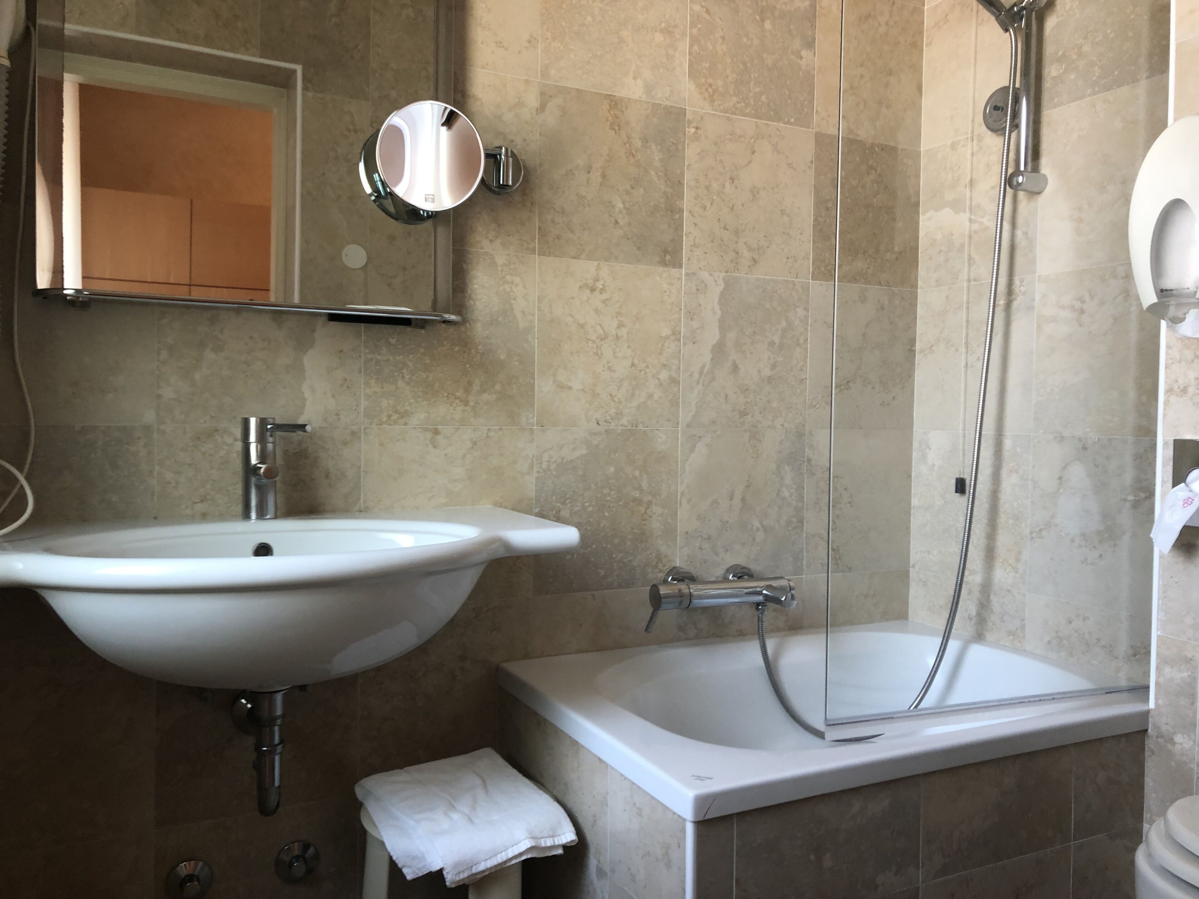 comfort single room | bathroom | hair dryer, slippers, bidet, towels