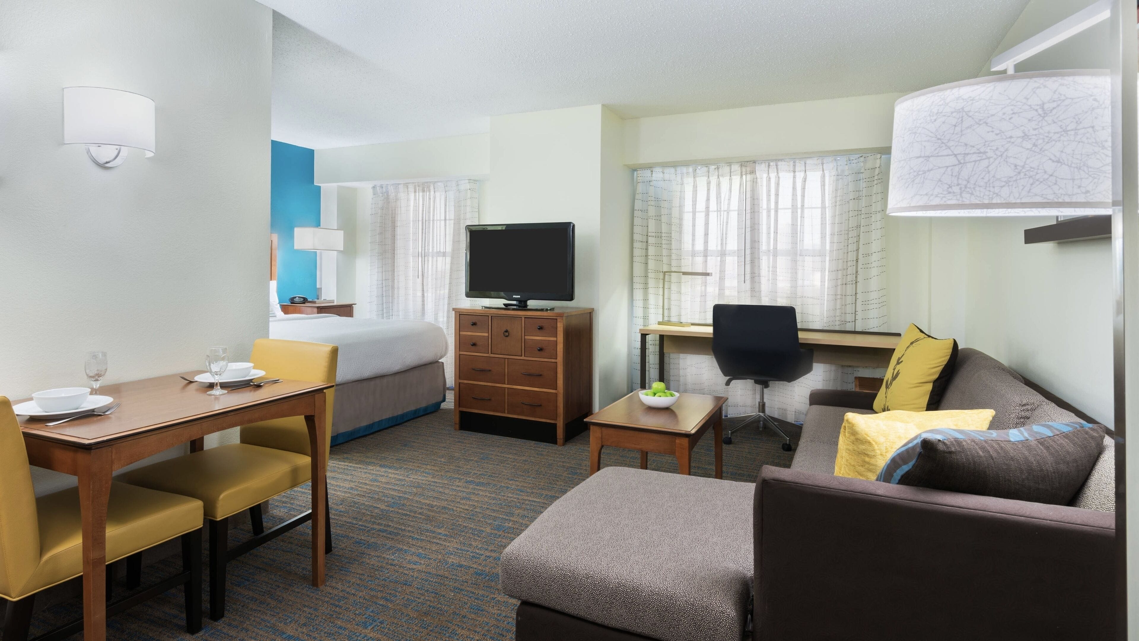 premium bedding, desk, laptop workspace, blackout curtains