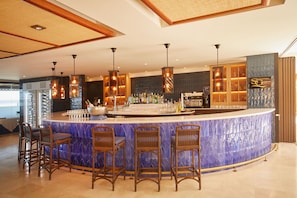 3 bars/lounges, swim-up bar, beach bar