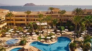 Indoor pool, 2 outdoor pools, open 10:00 AM to 6:00 PM, pool umbrellas - Secrets Bahia Real Resort & Spa (La Oliva)