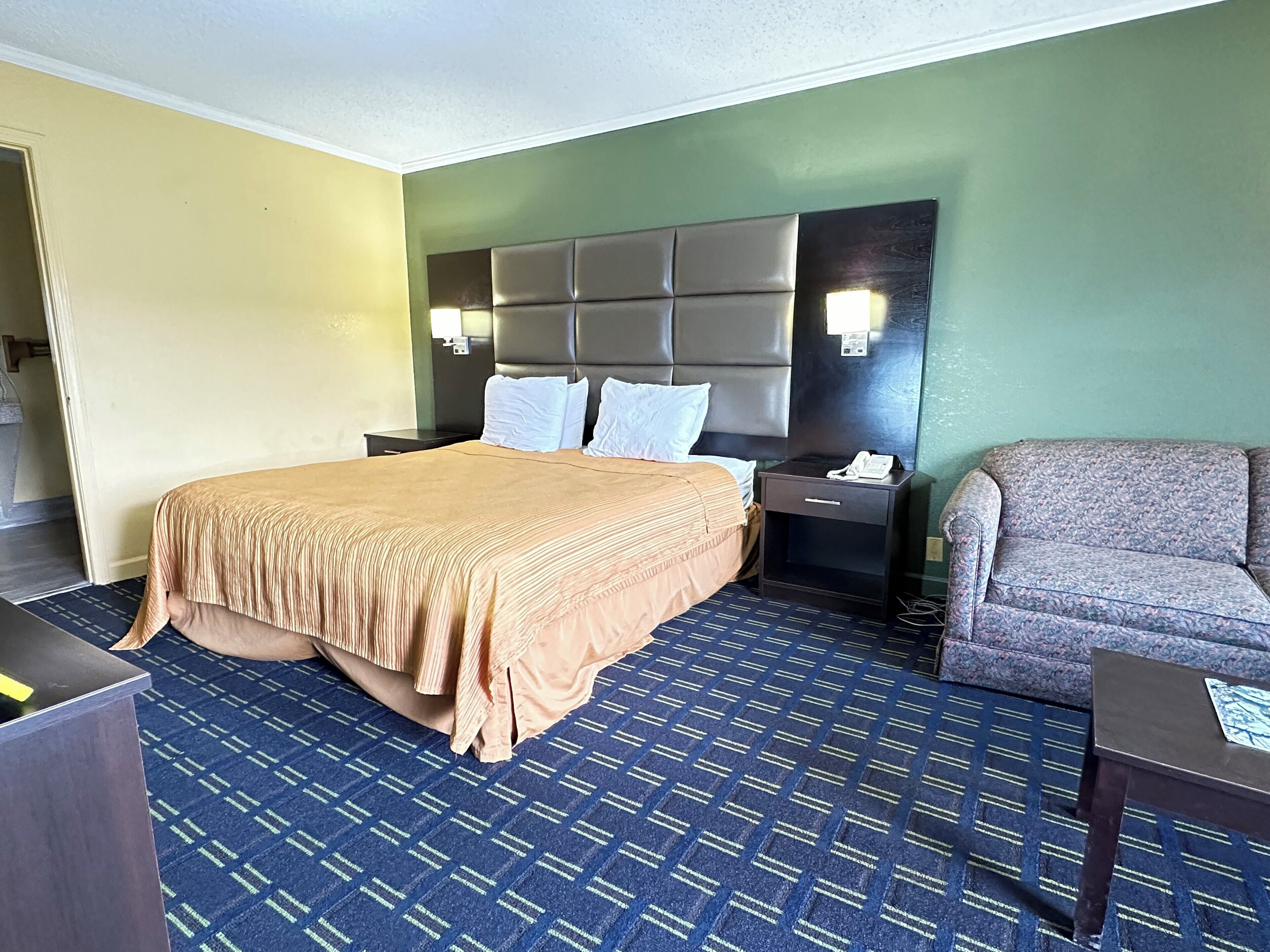 Desk, blackout curtains, bed sheets, alarm clocks