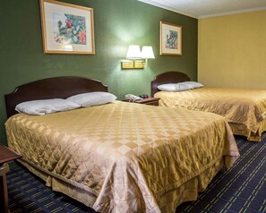 Desk, blackout drapes, bed sheets, alarm clocks