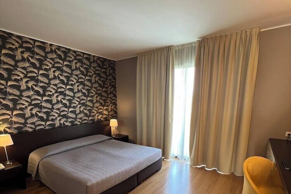 Pillow-top beds, minibar, in-room safe, desk