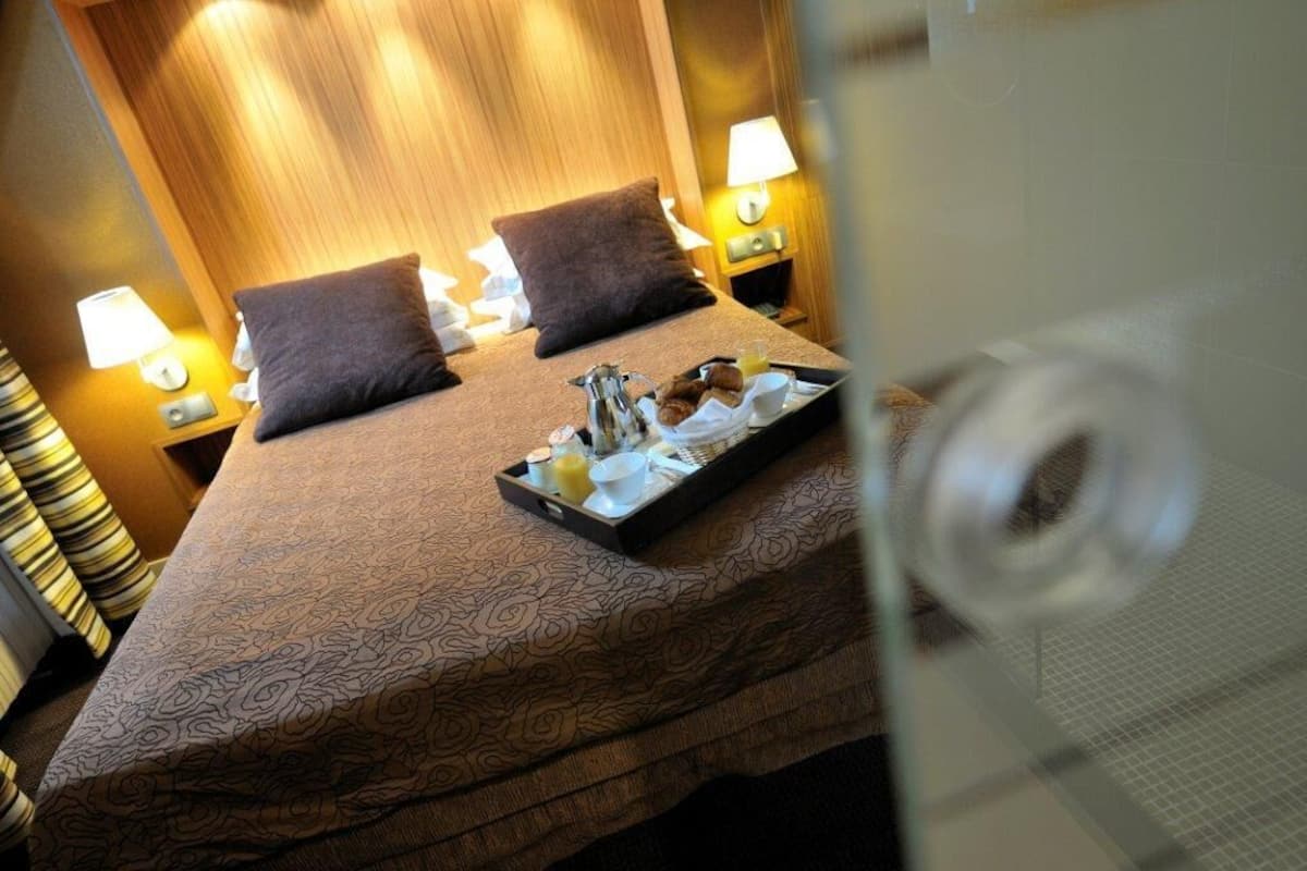 Cozy Room | Minibar, in-room safe, individually decorated, individually furnished