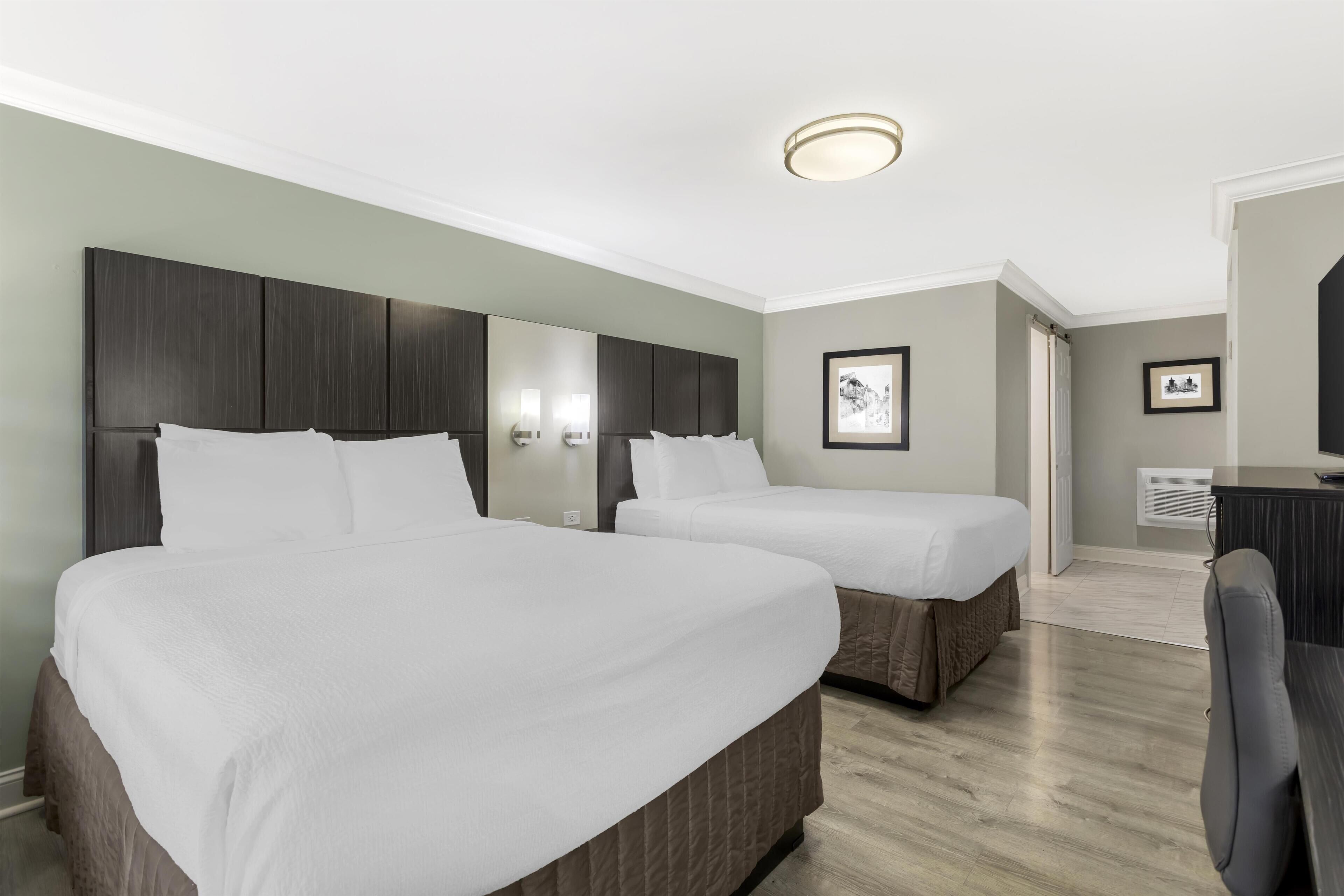 Standard Room, 2 Queen Beds, Non Smoking, Refrigerator & Microwave | Hypo-allergenic bedding, desk, laptop workspace, iron/ironing board