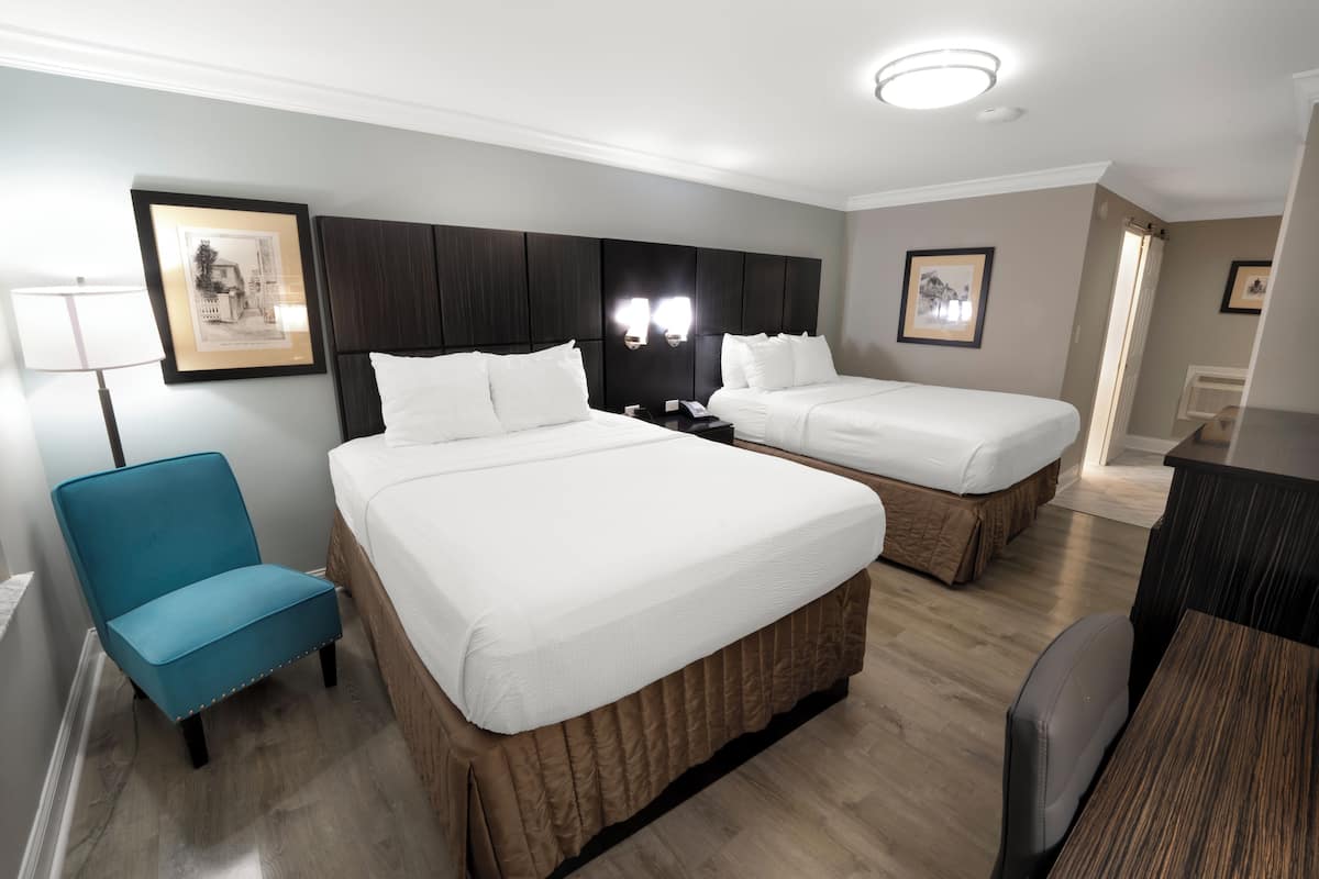 standard room, 2 queen beds, accessible, bathtub | hypo-allergenic bedding, desk, laptop workspace, iron/ironing board