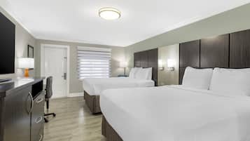 Habitación estándar, 2 camas Queen size, para no fumadores, refrigerador y microondas | Ropa de cama hipoalergénica y escritorio