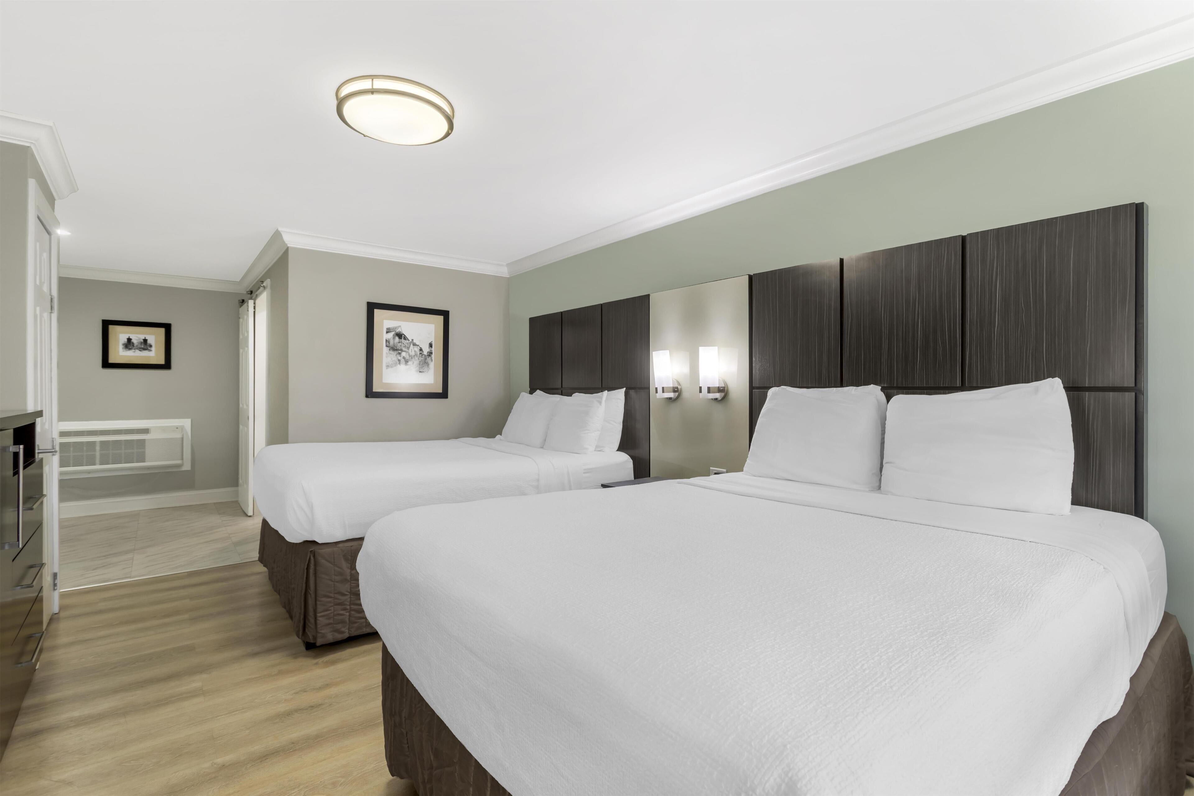 Hypo-allergenic bedding, desk, laptop workspace, iron/ironing board