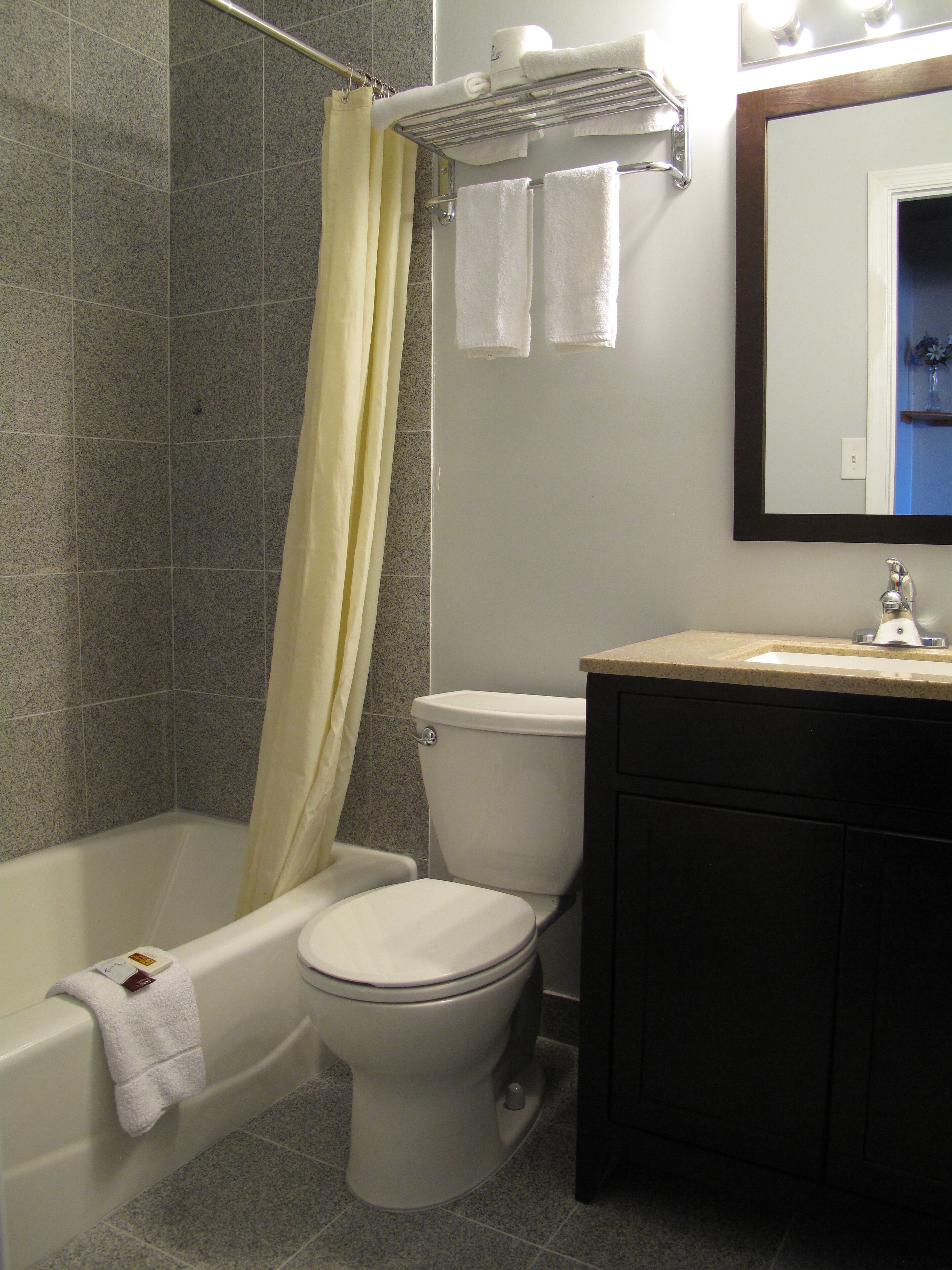 Combined shower/bathtub, eco-friendly toiletries, towels, soap