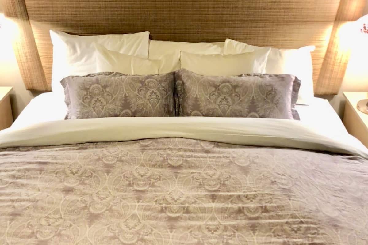 Premium bedding, down duvets, in-room safe, individually decorated