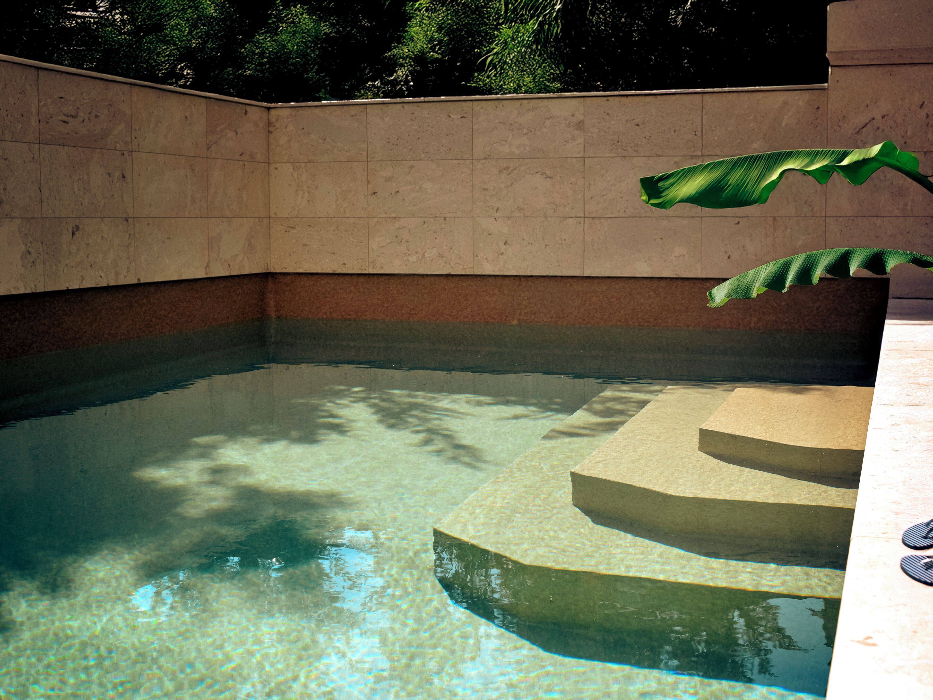 Seasonal outdoor pool, pool loungers, lifeguards on site