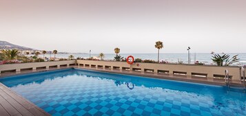Outdoor pool, open 10:00 AM to 6:30 PM, sun loungers