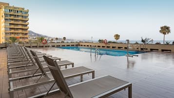 Outdoor pool, open 10:00 AM to 6:30 PM, sun loungers