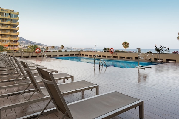 Outdoor pool, open 10:00 AM to 6:30 PM, sun loungers