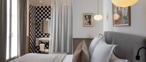 Premium bedding, in-room safe, desk, soundproofing