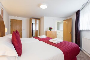 In-room safe, desk, iron/ironing board, free cribs/infant beds