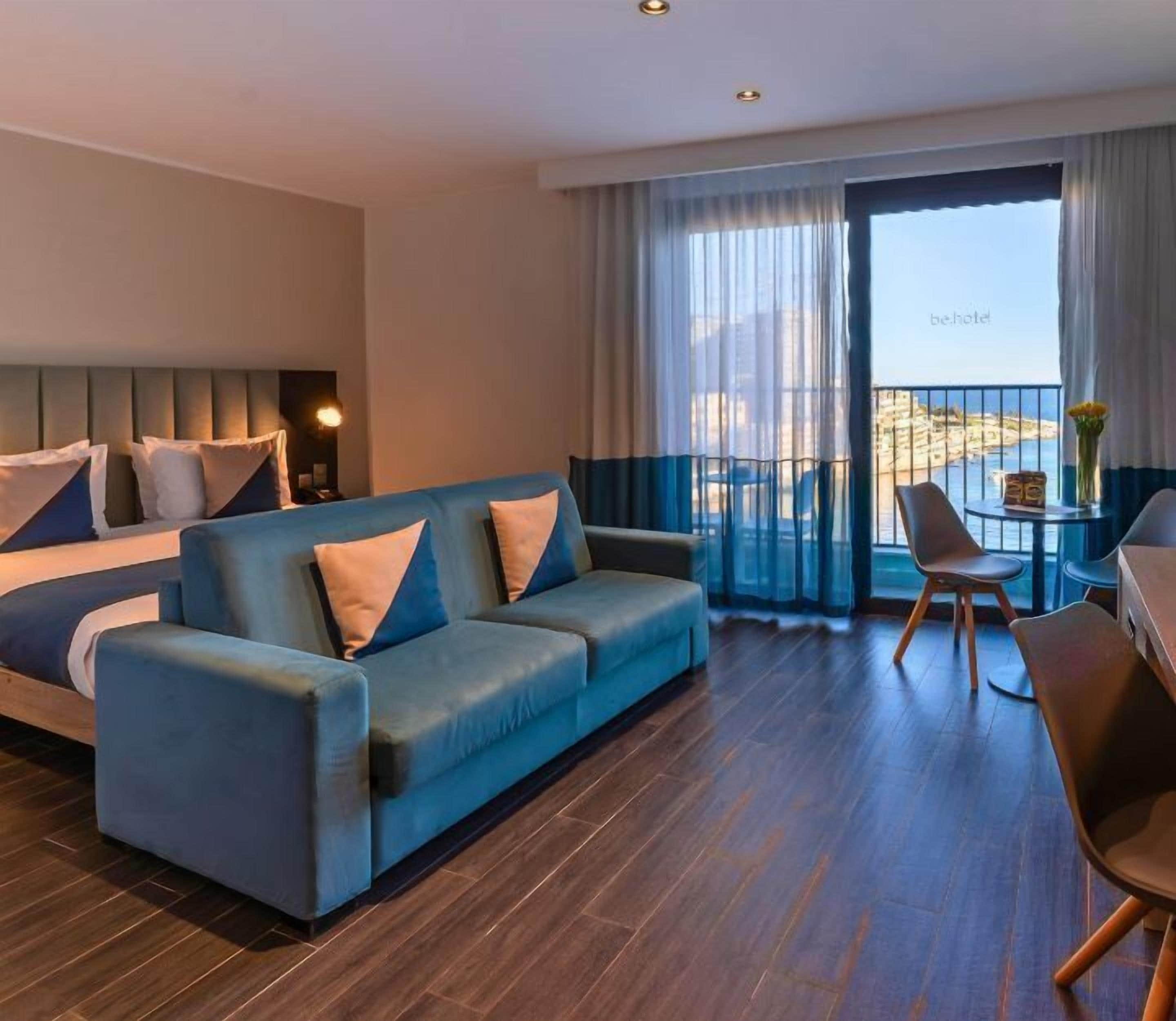 Superior Double Room, Balcony, Sea View | Living area | LCD TV, pay movies