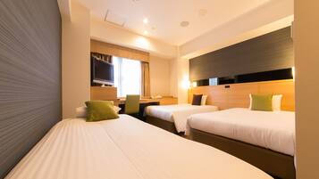 Chambre Triple, non-fumeurs | 1 chambre, couette en duvet d'oie, coffres-forts dans les chambres