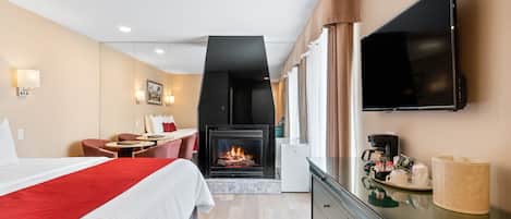 Chambre, 1 trÚs grand lit, cheminée