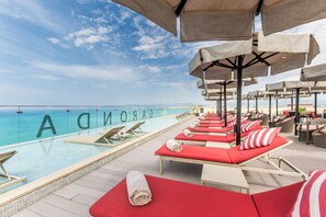 Indoor pool, outdoor pool, pool umbrellas, sun loungers