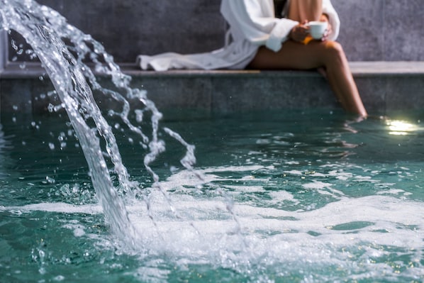 Indoor pool, outdoor pool, pool umbrellas, pool loungers
