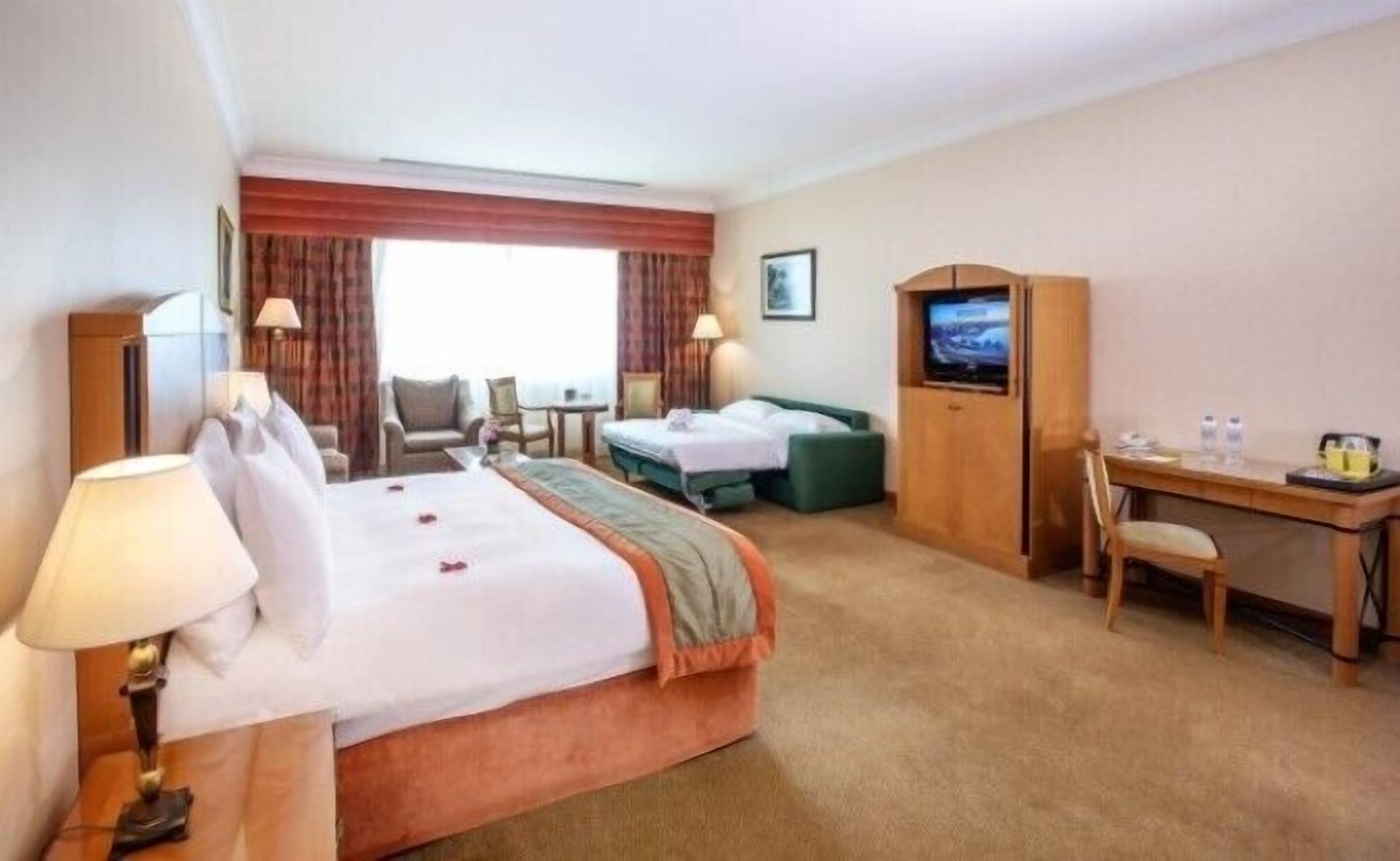 Egyptian cotton sheets, premium bedding, down comforters, minibar