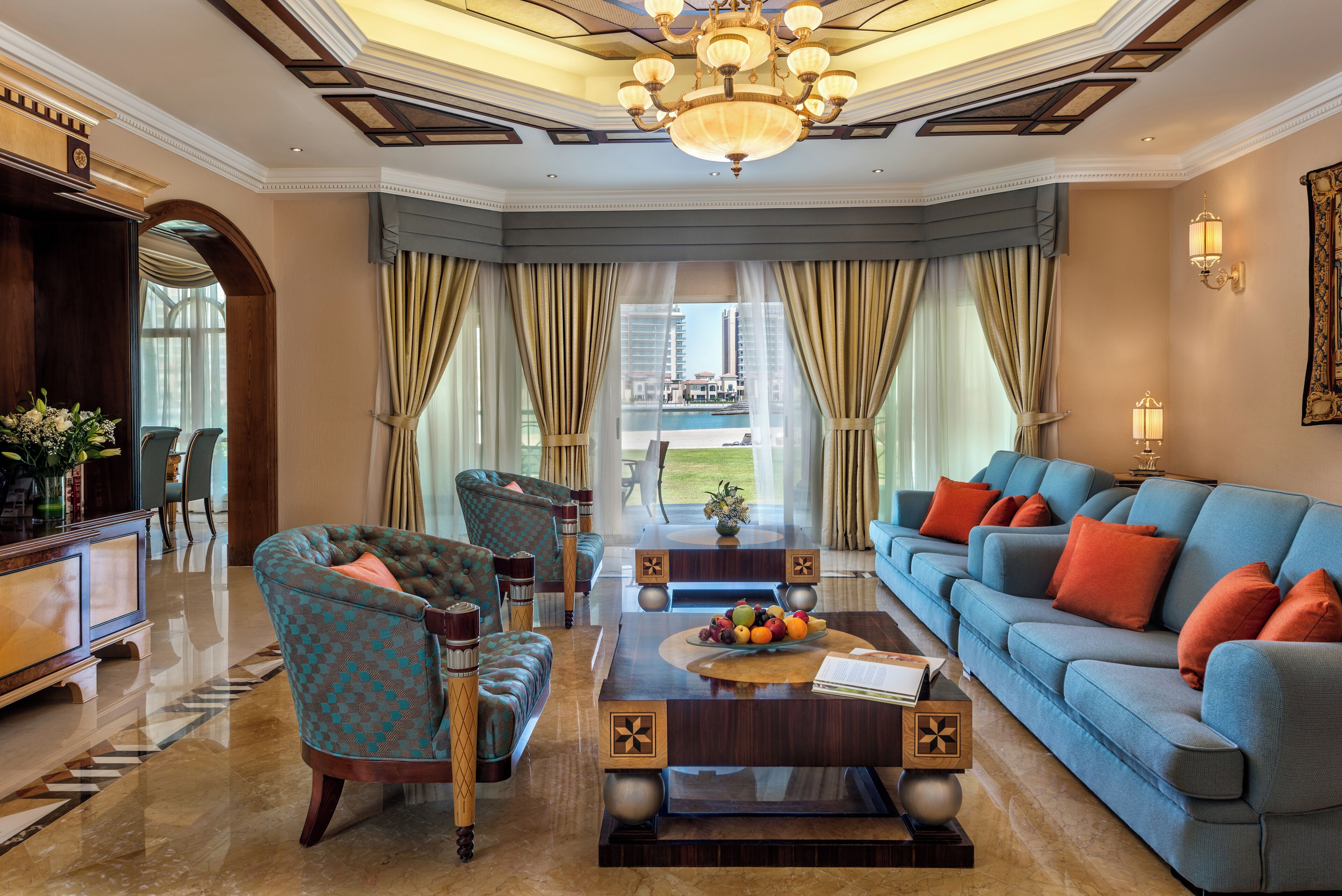 four bedroom villa - free daily shuttle bus to yas attractions, yas mall and grand mosque | living area | 32-inch lcd tv with satellite channels, tv, dvd player