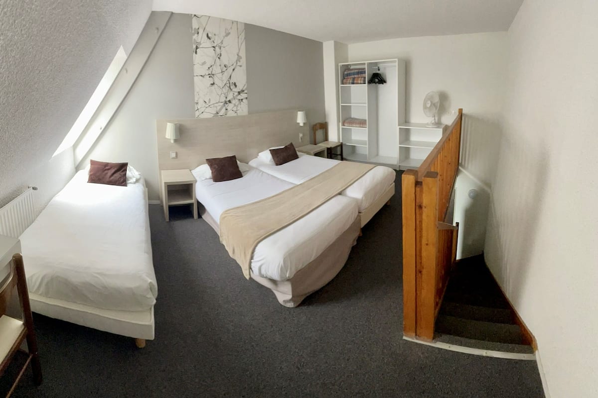 family room, city view (duplex) | desk, soundproofing, iron/ironing board, free wifi