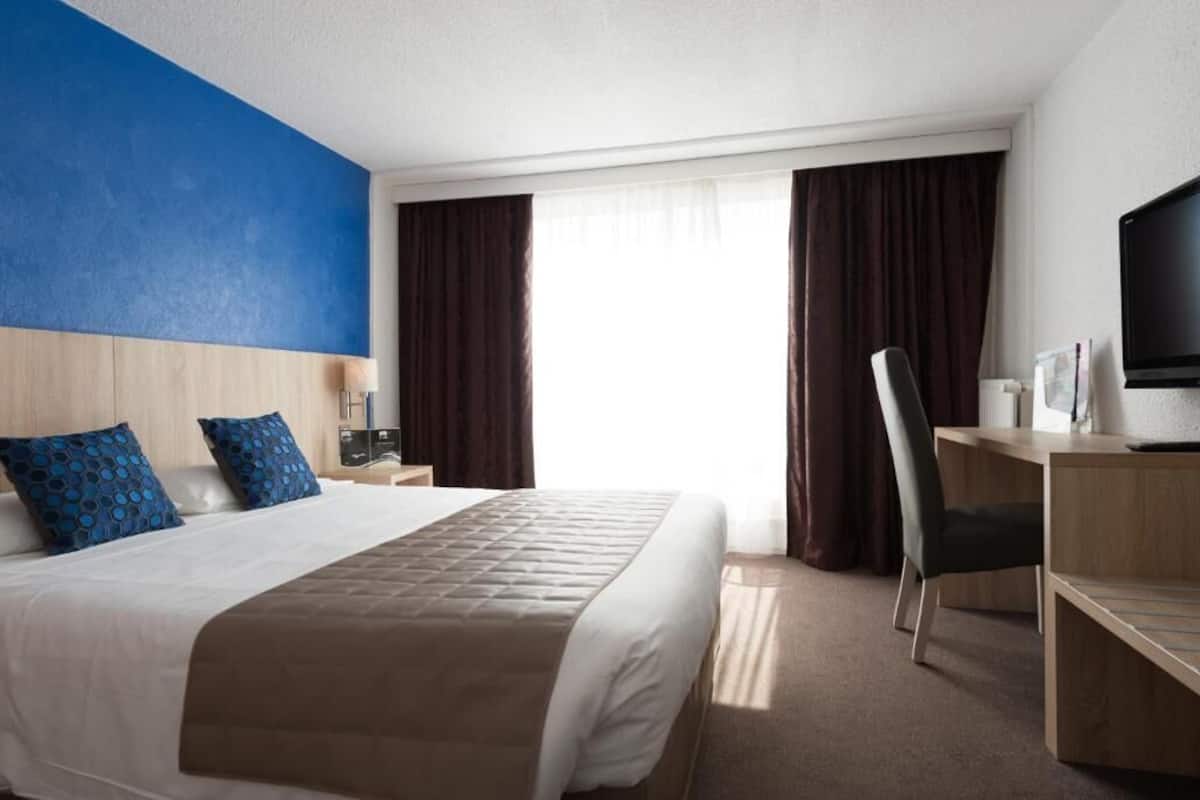 Chambre Triple Confort, 1 grand lit et 1 canapé-lit, vue ville | Vue sur la ville
