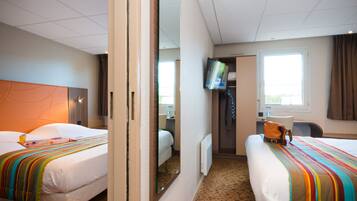 Desk, blackout drapes, soundproofing, iron/ironing board