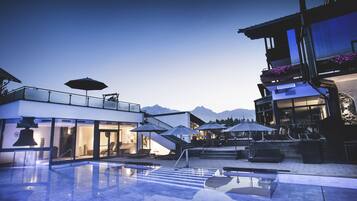 Indoor pool, outdoor pool, pool umbrellas, pool loungers